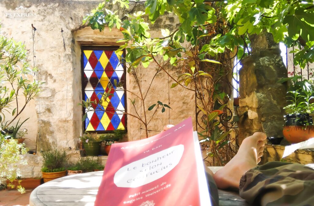 Patio in Ners with a book